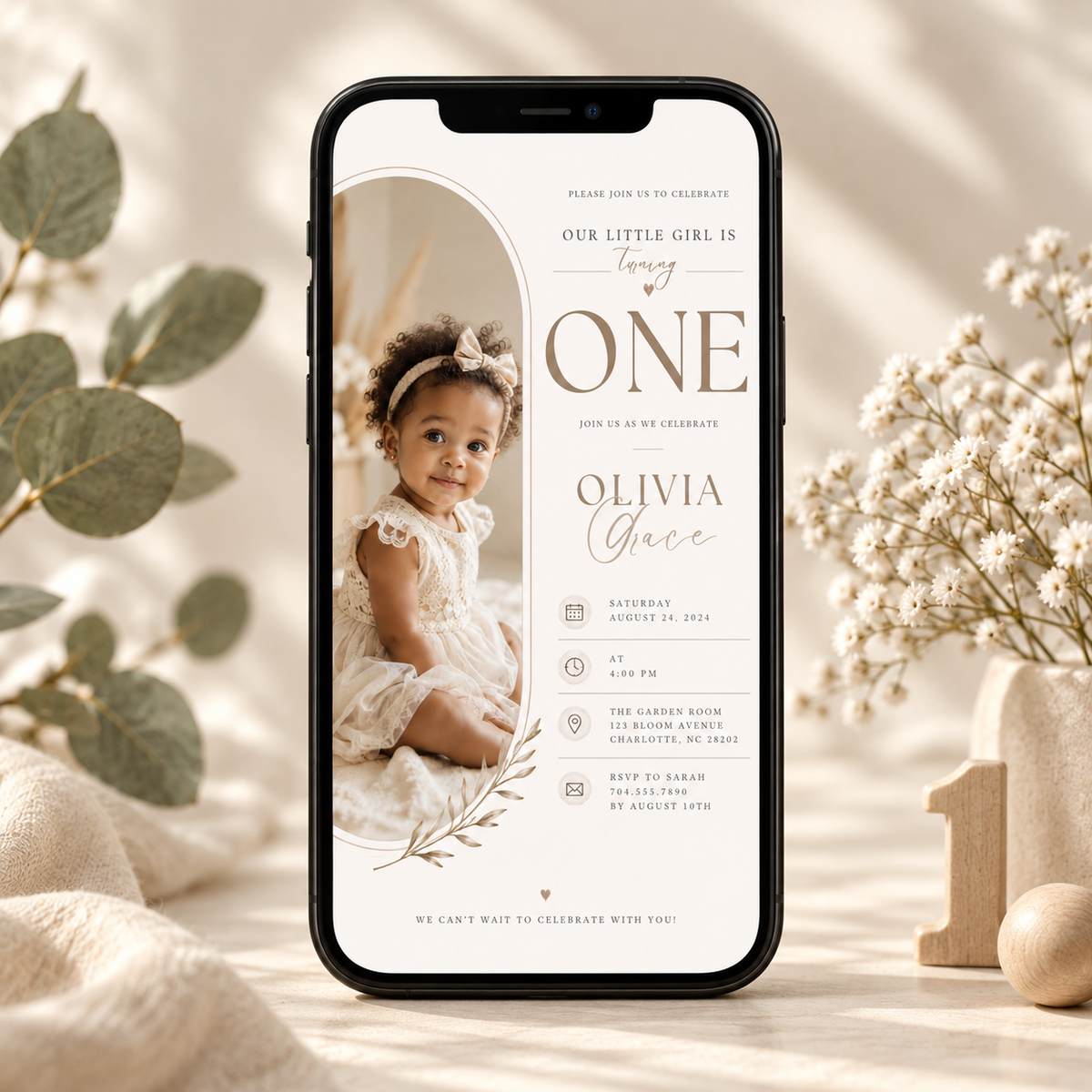 Phone: Little Baby 1 Year Old Party Invite shown on a phone screen